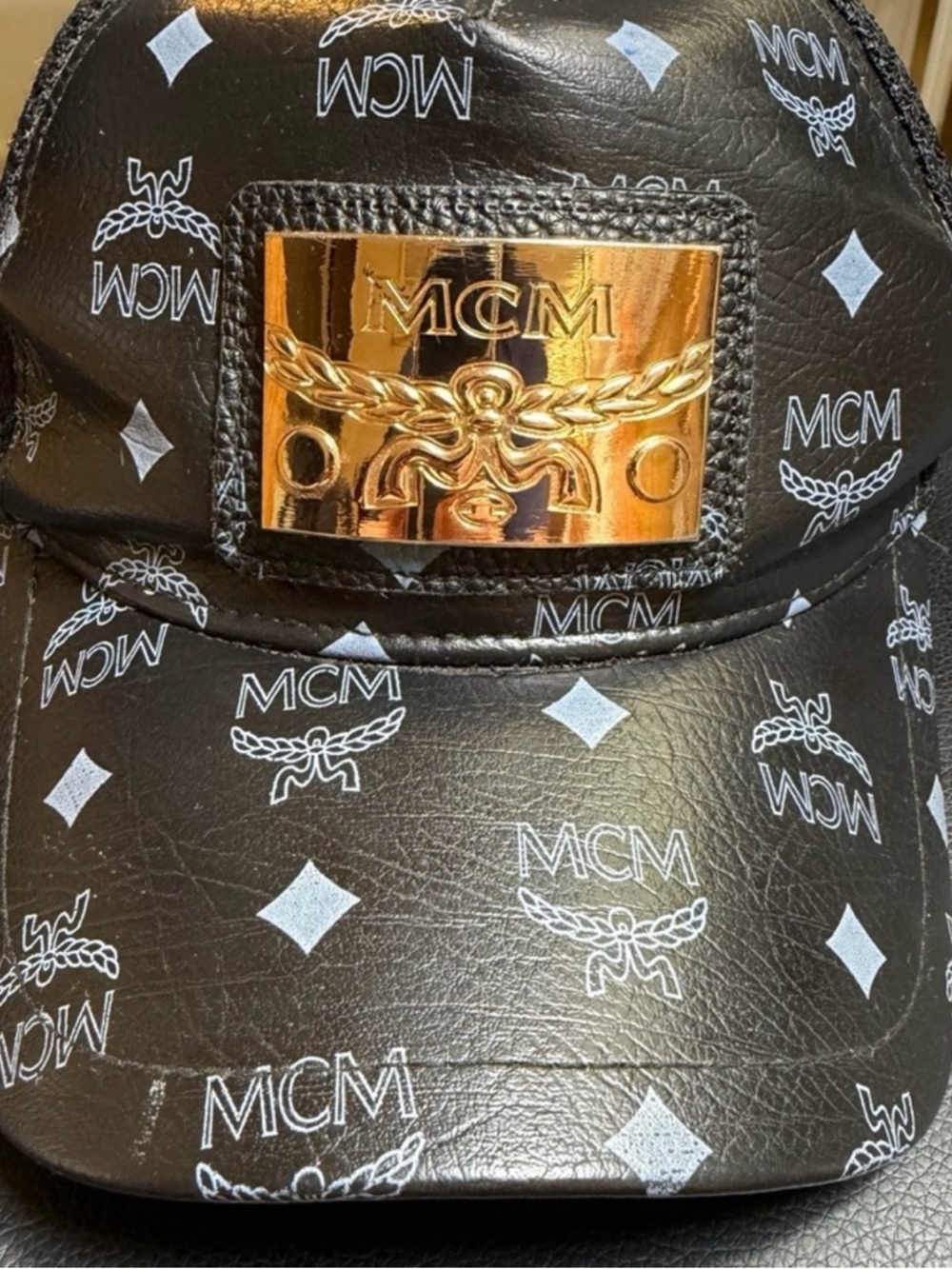 MCM Black Leather Logo Cap with Gold Plate Accent